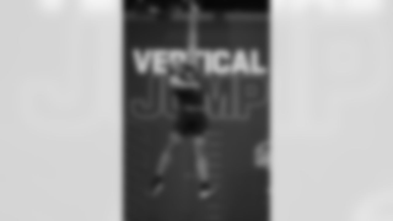 Kansas offensive lineman Enrique Cruz Jr. (17) runs a drill at the NFL football scouting combine in Indianapolis, Sunday, March 1, 2026. (AP Photo/Julio Cortez)