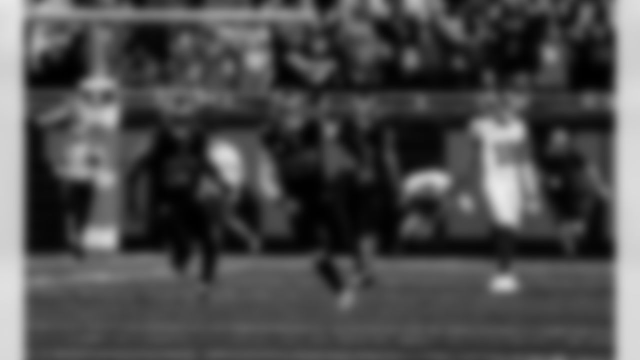 Detroit Lions edge rusher Al-Quadin Muhammad (96) and Detroit Lions edge rusher Aidan Hutchinson (97) after an NFL football game against the New York Giants on Sunday, Nov. 23, 2025 in Detroit. (Jeff Nguyen/Detroit Lions via AP)