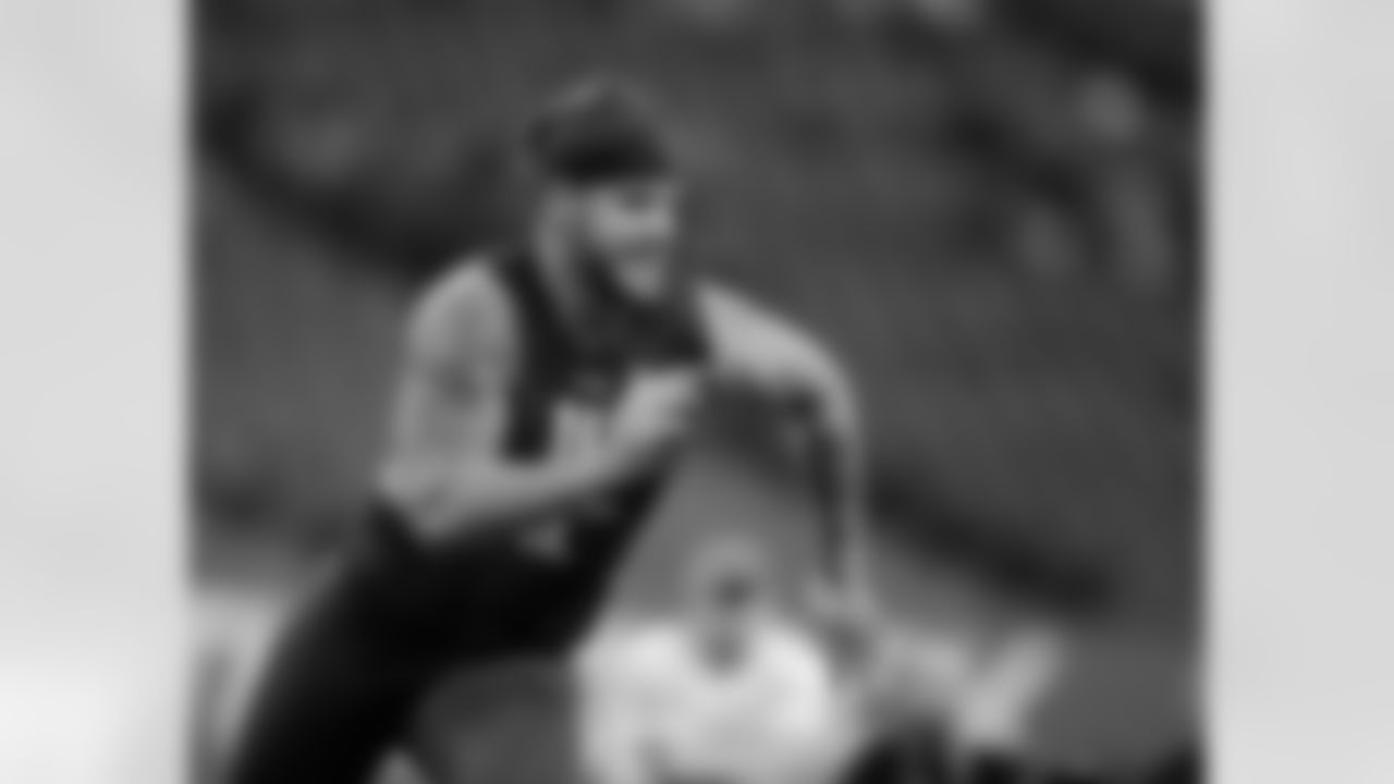 Ohio State offensive lineman Taylor Decker runs a drill at the NFL football scouting combine on Friday, Feb. 26, 2016, in Indianapolis. (AP Photo/Darron Cummings)