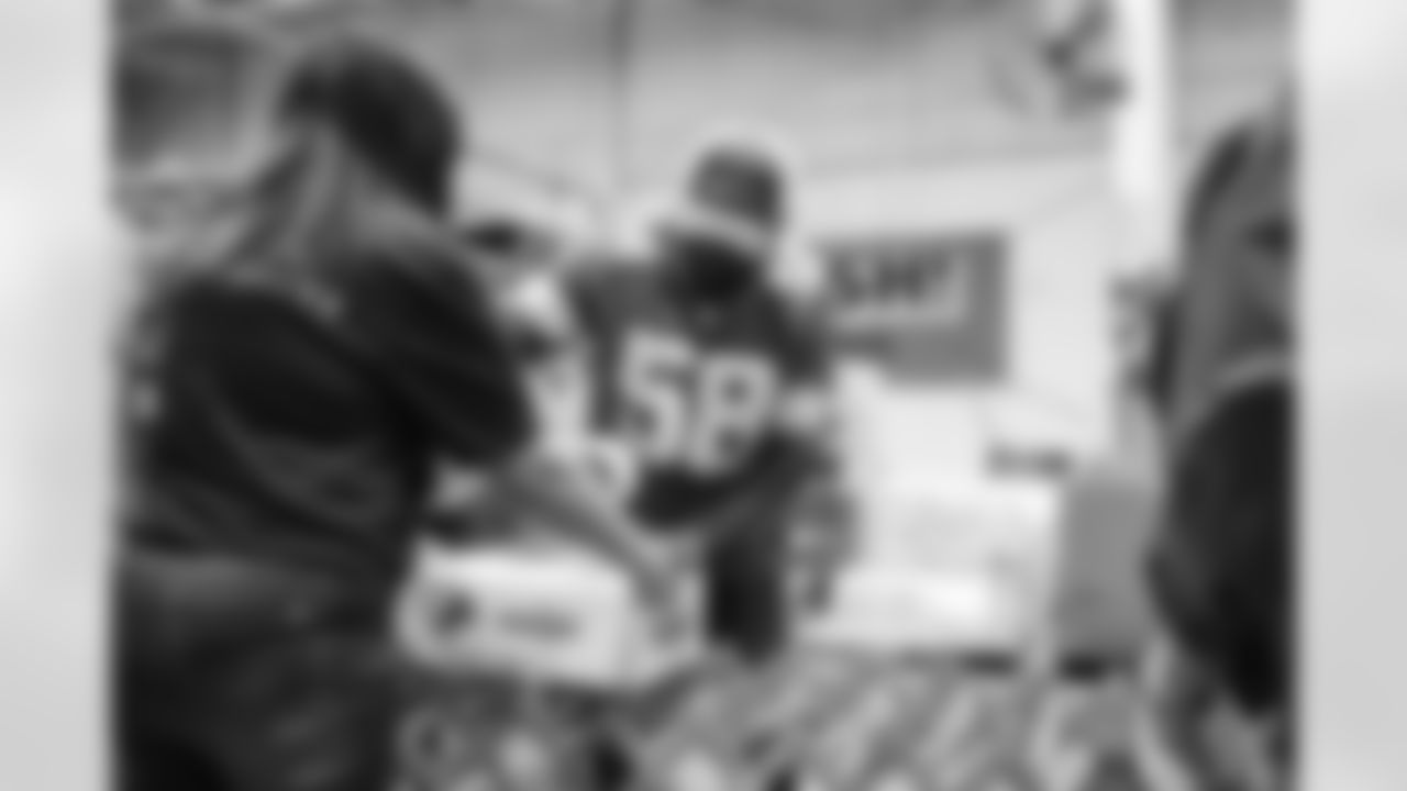 Lions Legend George Jamison (58) during a Thanksgiving meal packing event at the Gleaners Community Food Bank in Taylor, MI on October 30, 2024. (Stephanie VanWagoner/Detroit Lions)