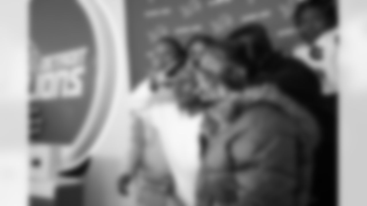 Students pose in the photobooth during the Presents from the Pride event at Detroit Lions Academy on Dec. 16, 2025 in Detroit. (Izzy Rincon/Detroit Lions)