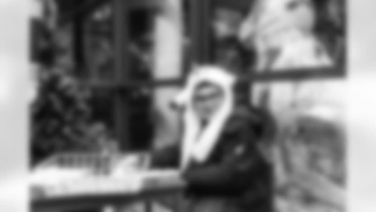 A Cub Club member smiles for a photo during the Cub Club Wild Lights event at the Detroit Zoo on Dec. 10, 2025 in Royal Oak, Mich. (Stephanie VanWagoner/Detroit Lions)