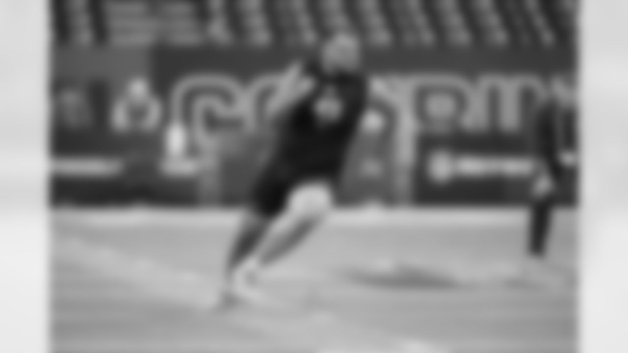 Boston College offensive lineman Logan Taylor (49) runs a drill at the NFL football scouting combine in Indianapolis, Sunday, March 1, 2026. (AP Photo/Michael Conroy)