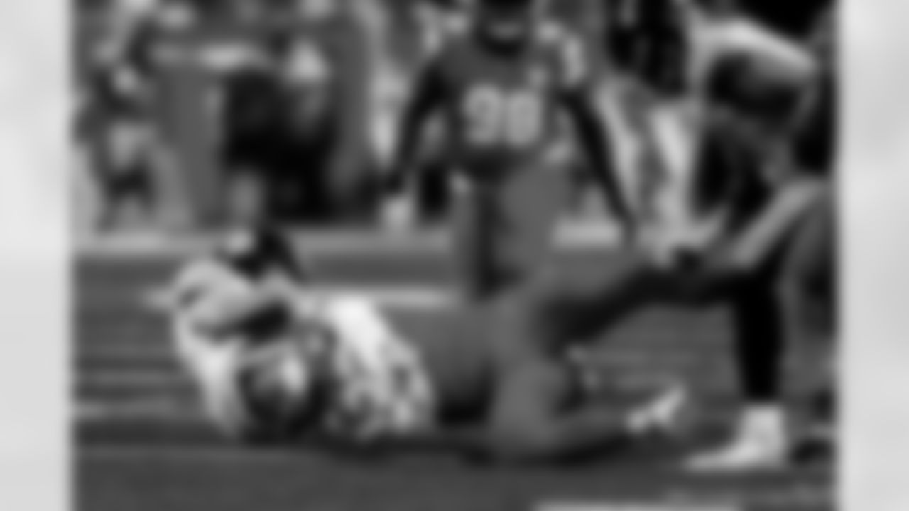 Detroit Lions edge rusher Aidan Hutchinson (97) sacks Pittsburgh Steelers quarterback Aaron Rodgers (8) during an NFL football game against the Pittsburgh Steelers on Sunday, Dec. 21, 2025 in Detroit. (Jeff Nguyen/Detroit Lions via AP)