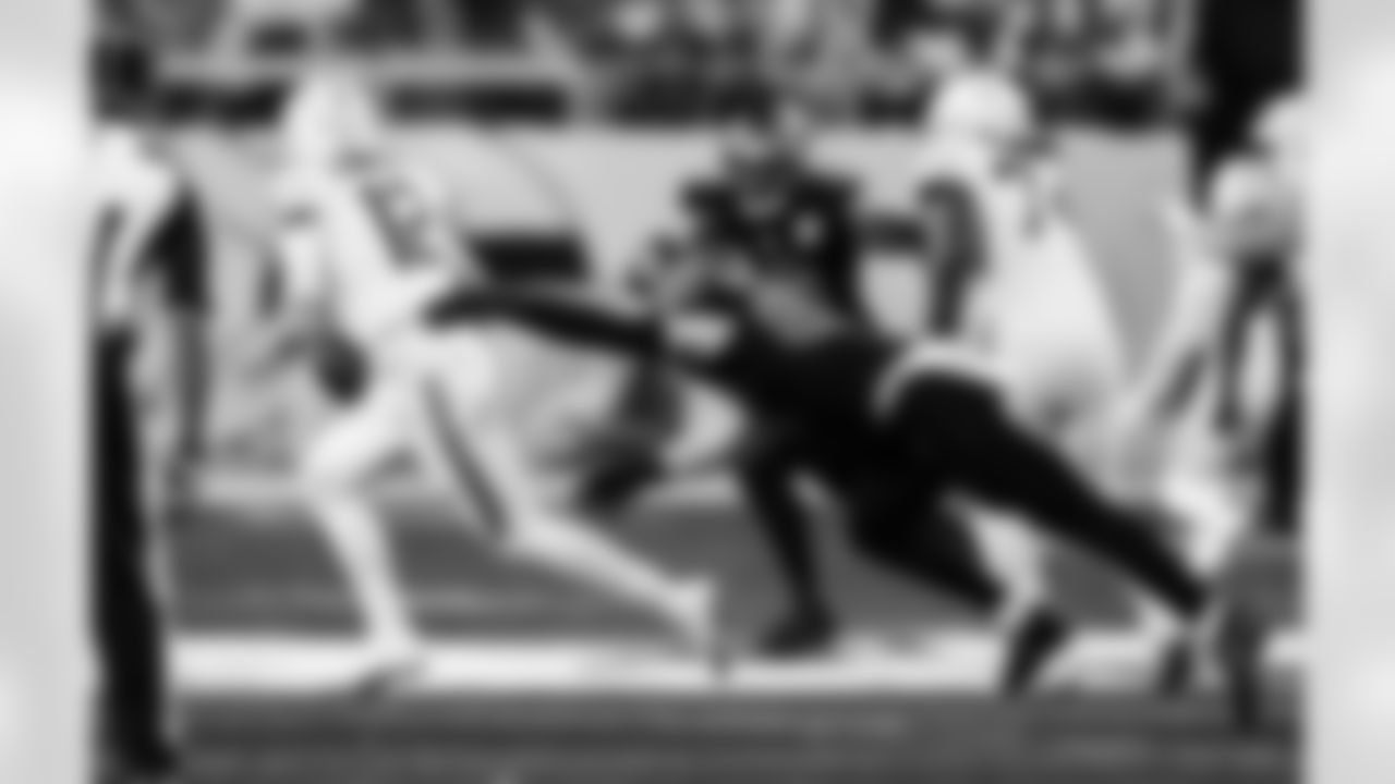 Detroit Lions edge rusher Aidan Hutchinson (97) sacks Minnesota Vikings quarterback Max Brosmer (12) during an NFL football game against the Minnesota Vikings on Thursday, Dec. 25, 2025 in Minneapolis. (Jeff Nguyen/Detroit Lions via AP)