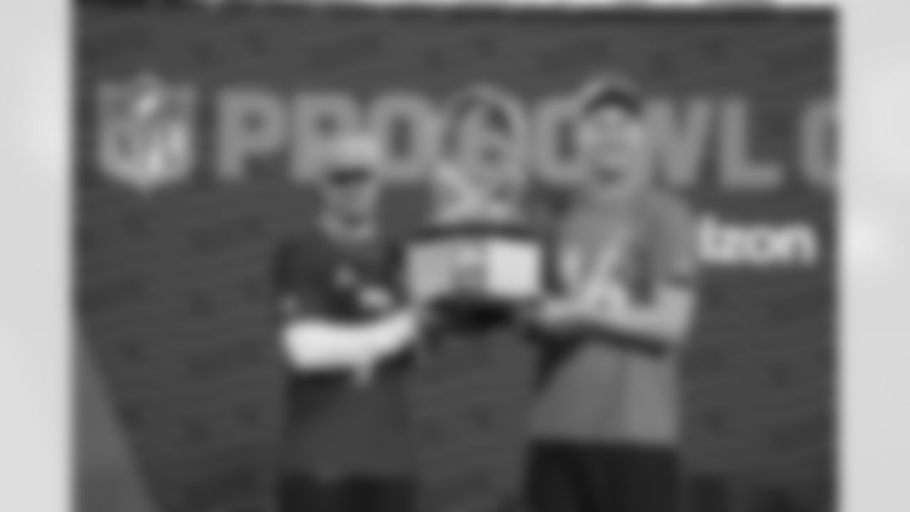 Minnesota Vikings cornerback Byron Murphy Jr. (7) and Detroit Lions quarterback Jared Goff (16) celebrate after the 2025 Pro Bowl Games Championship on Sunday, February 2, 2025 in Orlando, Florida. (Perry Knotts/NFL)