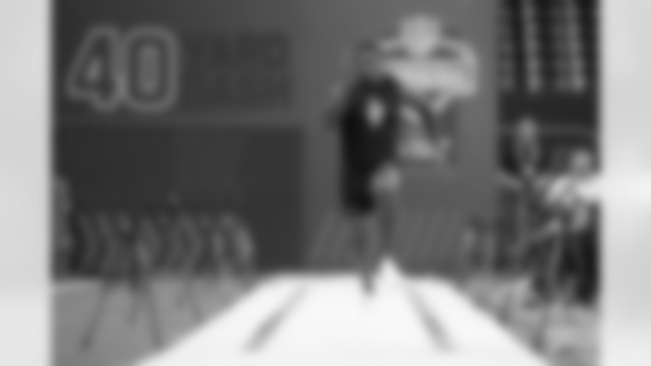 Texas linebacker Anthony Hill Jr. (12) runs the 40-yard dash at the NFL football scouting combine in Indianapolis, Thursday, Feb. 26, 2026. (AP Photo/Michael Conroy)