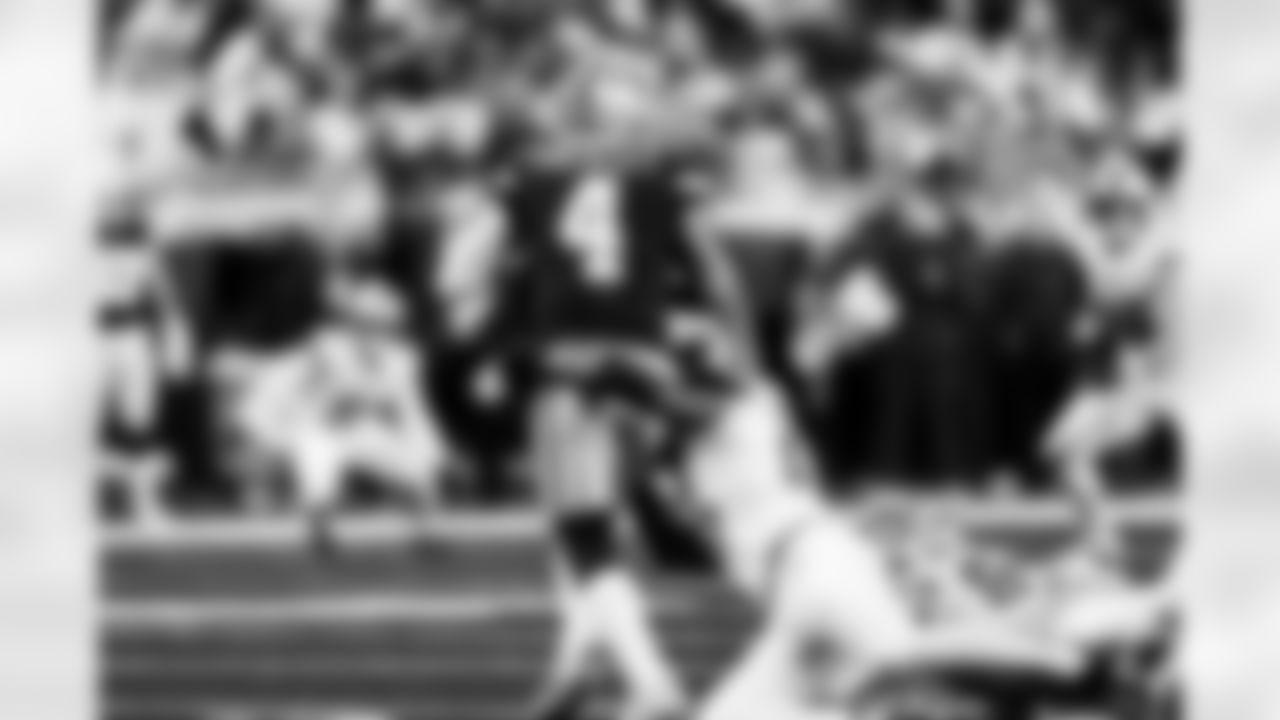 Detroit Lions edge rusher Al-Quadin Muhammad (96) sacks Dallas Cowboys quarterback Dak Prescott (4) during an NFL football game against the Dallas Cowboys on Thursday, Dec. 4, 2025 in Detroit. (Jeff Nguyen/Detroit Lions via AP)