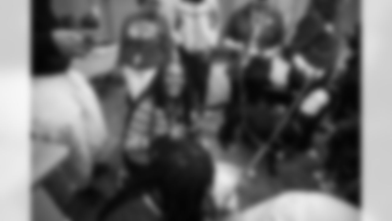 DLA students petting service dogs during a Detroit Lions Academy health and wellness field trip at the Henry Ford Health campus on Feb. 27, 2026 in Detroit. (Izzy Rincon/Detroit Lions)