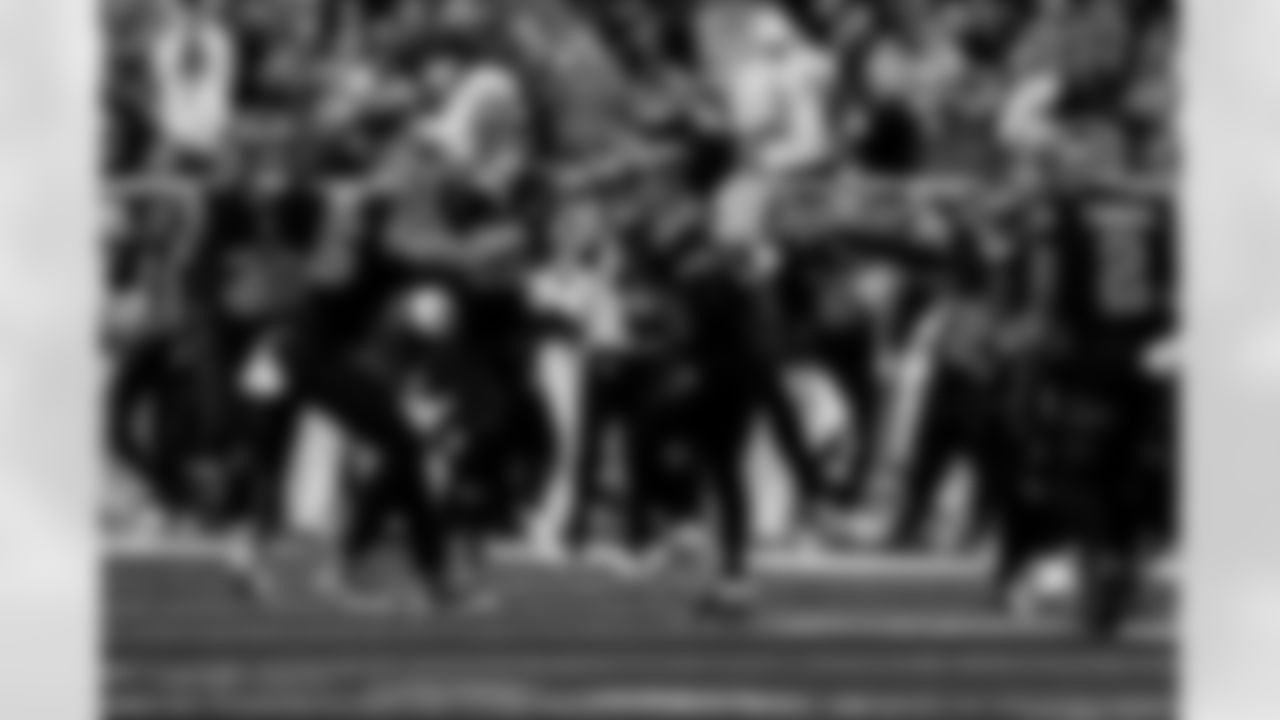 Detroit Lions safety Thomas Harper (12) celebrates with Detroit Lions defensive back Brian Branch (32), Detroit Lions linebacker Derrick Barnes (55), Detroit Lions linebacker Jack Campbell (46), Detroit Lions linebacker Alex Anzalone (34), Detroit Lions cornerback Amik Robertson (21) and Detroit Lions safety Daniel Thomas (2) during an NFL football game against the New York Giants on Sunday, Nov. 23, 2025 in Detroit. (Jeff Nguyen/Detroit Lions via AP)