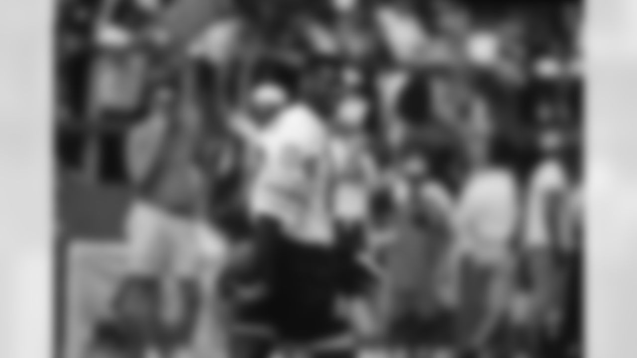 Detroit Lions wide receiver Herman Moore (84, NFC) smiles during the Pro Bowl Battle of the Gridiron event in Honolulu, HI, Feb. 1, 1996. (Paul Spinelli via AP)