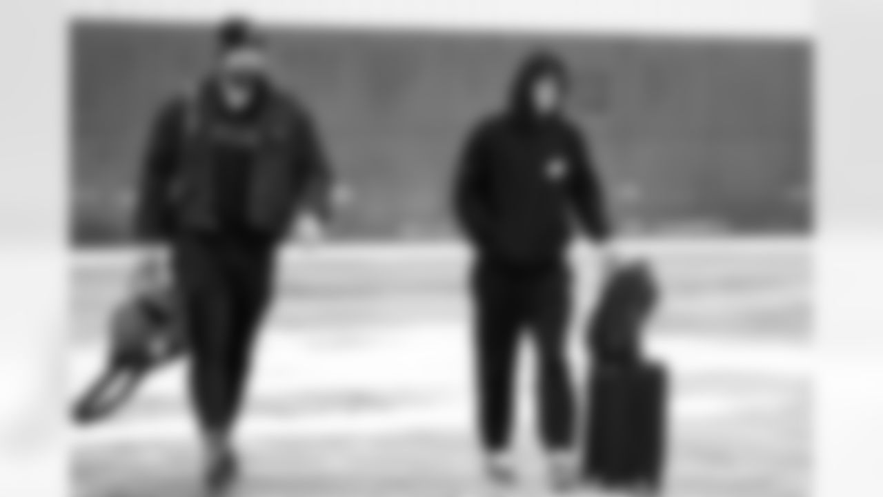 Detroit Lions tackle Dan Skipper (70) and Detroit Lions quarterback Jared Goff (16) travel to Chicago on Jan. 3, 2026. (Jeff Nguyen/Detroit Lions via AP)