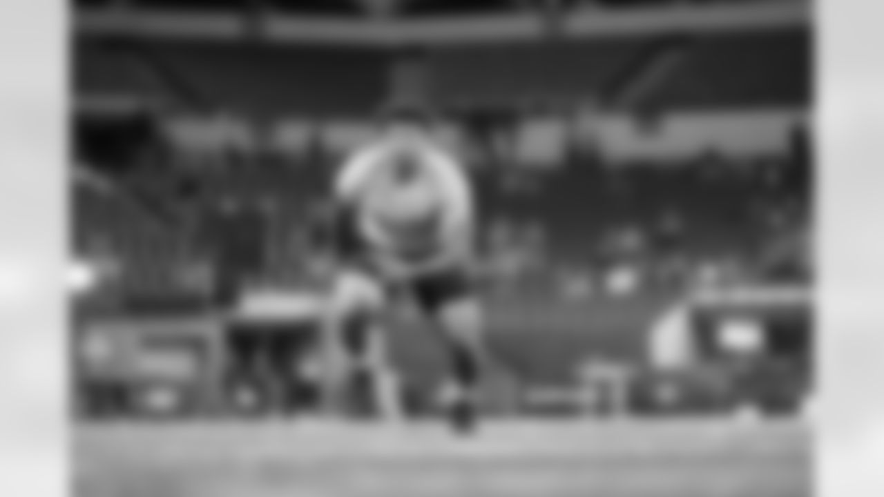 Boston College offensive lineman Christian Mahogany runs a drill at the NFL football scouting combine, Sunday, March 3, 2024, in Indianapolis. (AP Photo/Michael Conroy)