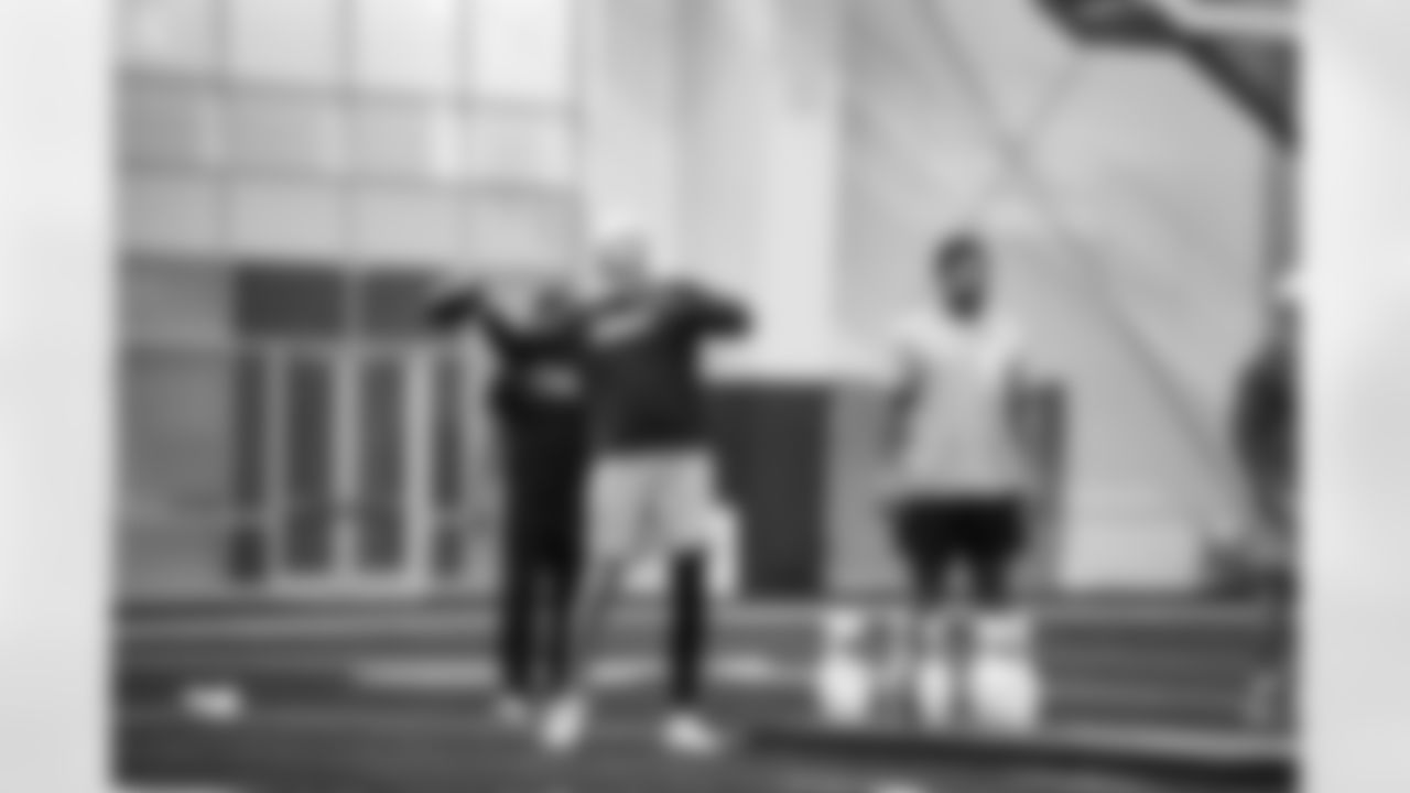 Detroit Lions quarterback Nate Sudfeld (8), Detroit Lions tackle Penei Sewell (58) during a fowling team activity at the Meijer Performance Center in Allen Park, MI on August 13, 2024. (Jeff Nguyen/Detroit Lions)