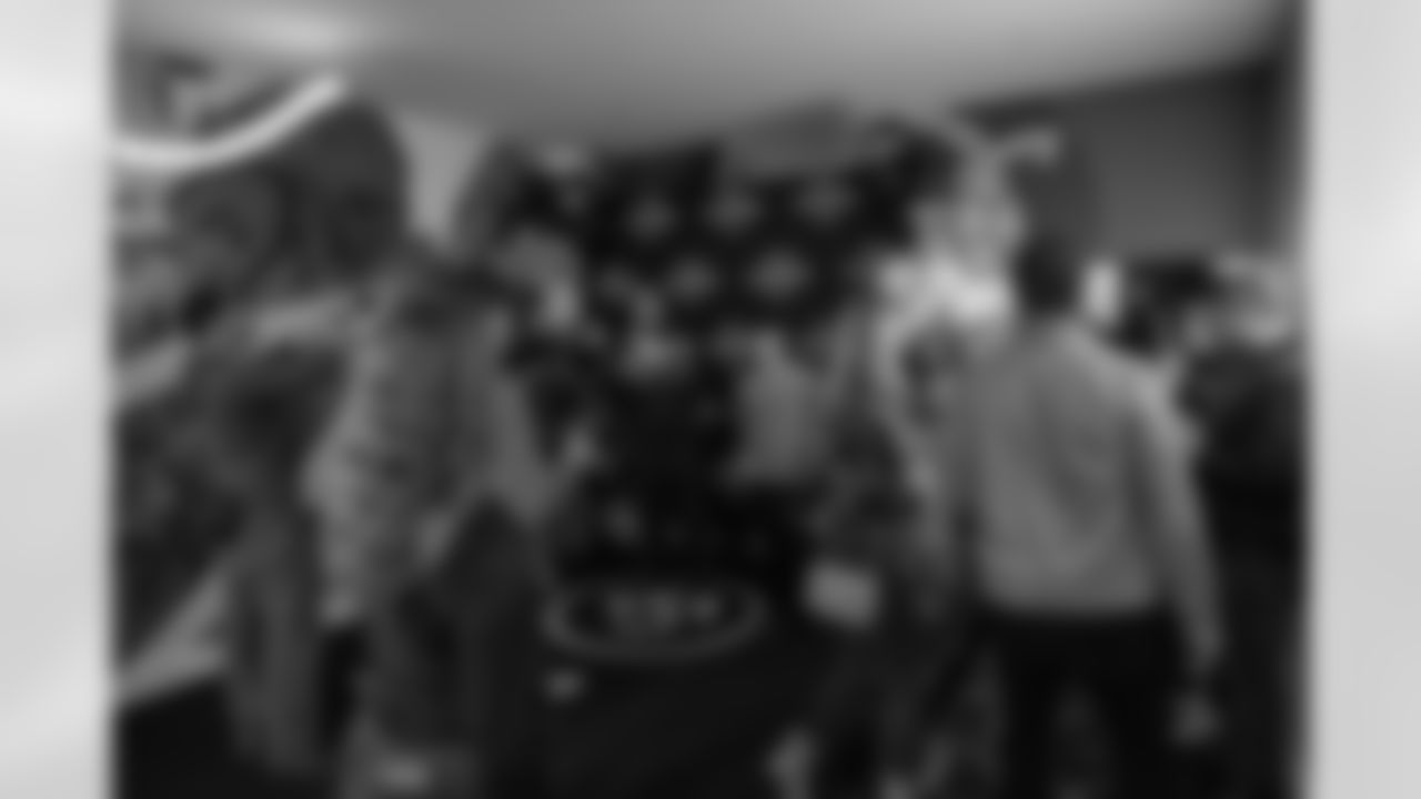 Detroit Lions wide receiver Amon-Ra St. Brown (14) and guests during a Strike for Literacy event at Five Iron Golf on Nov. 3, 2025 in Detroit.(Carl Jones II/Detroit Lions)