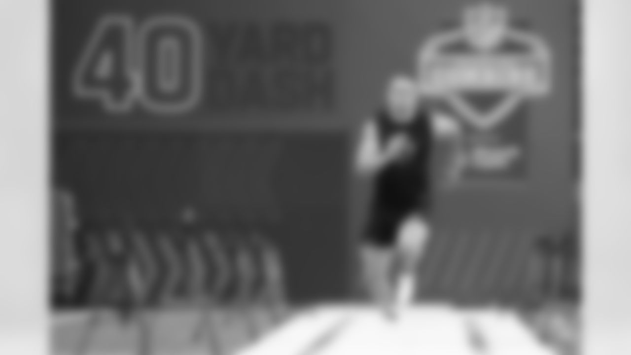 Wyoming tight end John Michael Gyllenborg (07) runs the 40-yard dash at the NFL football scouting combine in Indianapolis, Friday, Feb. 27, 2026. (AP Photo/Michael Conroy)