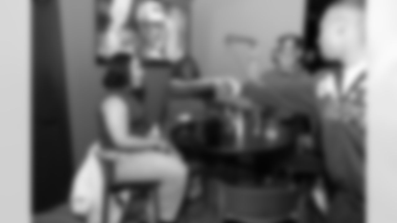 Detroit Lions wide receiver Amon-Ra St. Brown (14) greets guests during a Strike for Literacy event at Five Iron Golf on Nov. 3, 2025 in Detroit.(Carl Jones II/Detroit Lions)