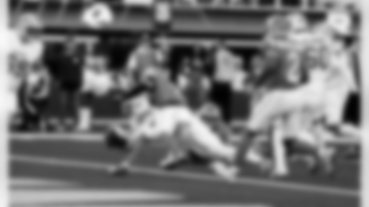 Detroit Lions wide receiver Amon-Ra St. Brown (14) scores a touchdown during an NFL football game against the Los Angeles Rams on Sunday, Dec. 14, 2025 in Inglewood, Calif. (Jeff Nguyen/Detroit Lions via AP)