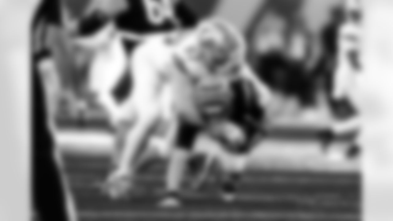 Detroit Lions edge rusher Aidan Hutchinson (97) makes a sack on Cincinnati Bengals quarterback Jake Browning (6) an NFL football game against the Cincinnati Bengals on Sunday, Oct. 5, 2025 in Cincinnati. (Jeff Nguyen/Detroit Lions via AP)