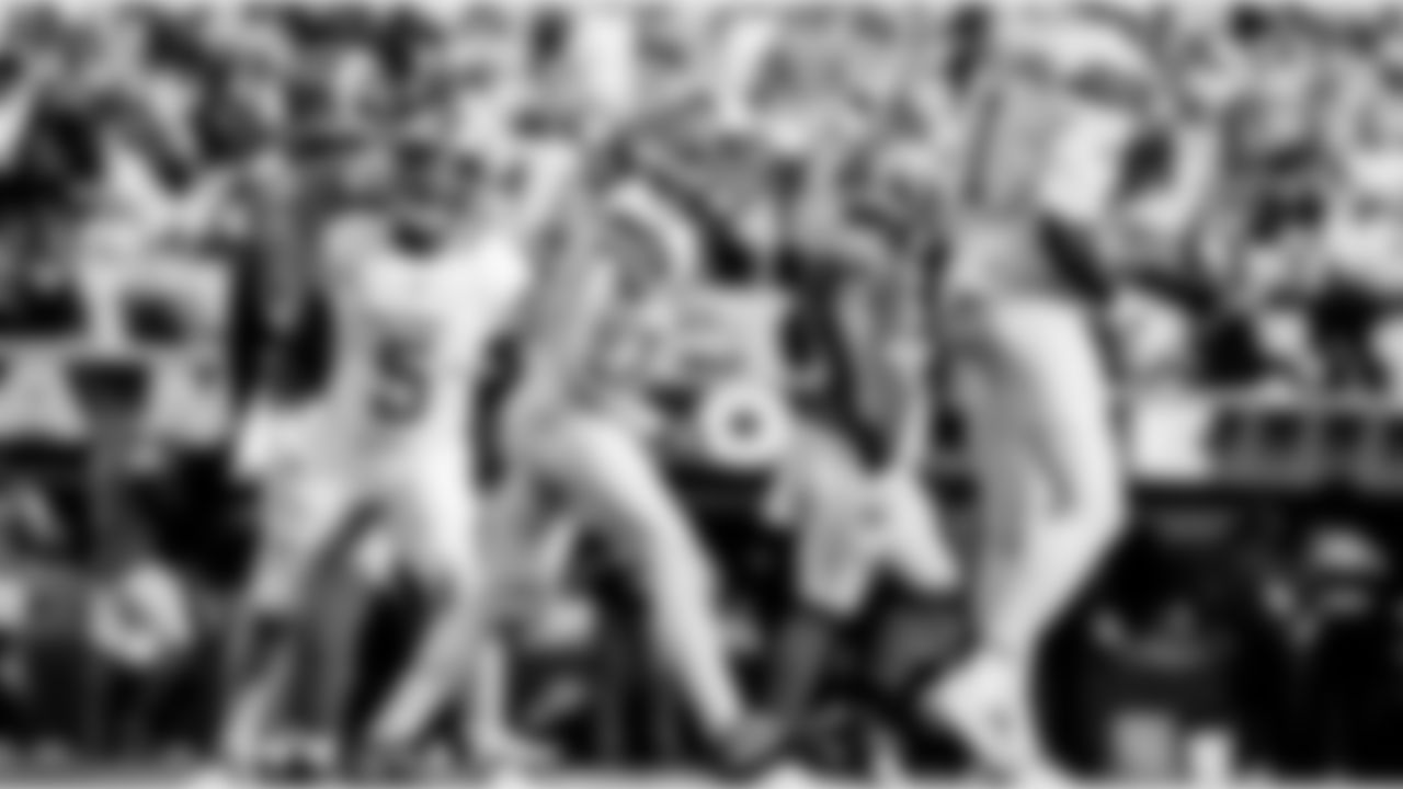 Detroit Lions running back David Montgomery (5), Detroit Lions wide receiver Amon-Ra St. Brown (14), and Detroit Lions wide receiver Jameson Williams (1) celebrate after a touchdown during an NFL football game against the Los Angeles Rams on Sunday, Dec. 14, 2025 in Inglewood, Calif. (Jeff Nguyen/Detroit Lions via AP)