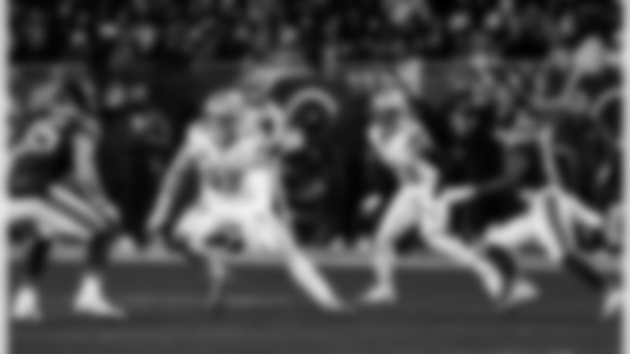 Detroit Lions edge rusher Aidan Hutchinson (97) and Detroit Lions cornerback Rock Ya-Sin (23) during an NFL football game against the Chicago Bears on Sunday, Jan. 4, 2026 in Chicago. (Jeff Nguyen/Detroit Lions via AP)