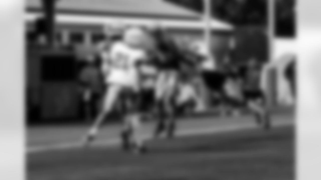 Detroit Lions cornerback Amik Robertson (21), Detroit Lions wide receiver Amon-Ra St. Brown (14), Detroit Lions cornerback Carlton Davis III (23) during training camp at the Meijer Performance Center in Allen Park, MI on August 1, 2024. (Jeff Nguyen/Detroit Lions)