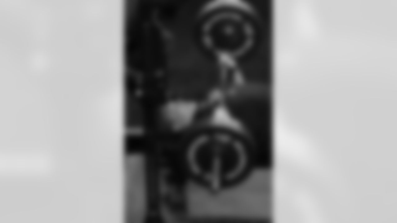 Auburn offensive lineman Connor Lew (32) lifts weights at the NFL football scouting combine in Indianapolis, Monday, March 2, 2026. (AP Photo/Eric Gay)