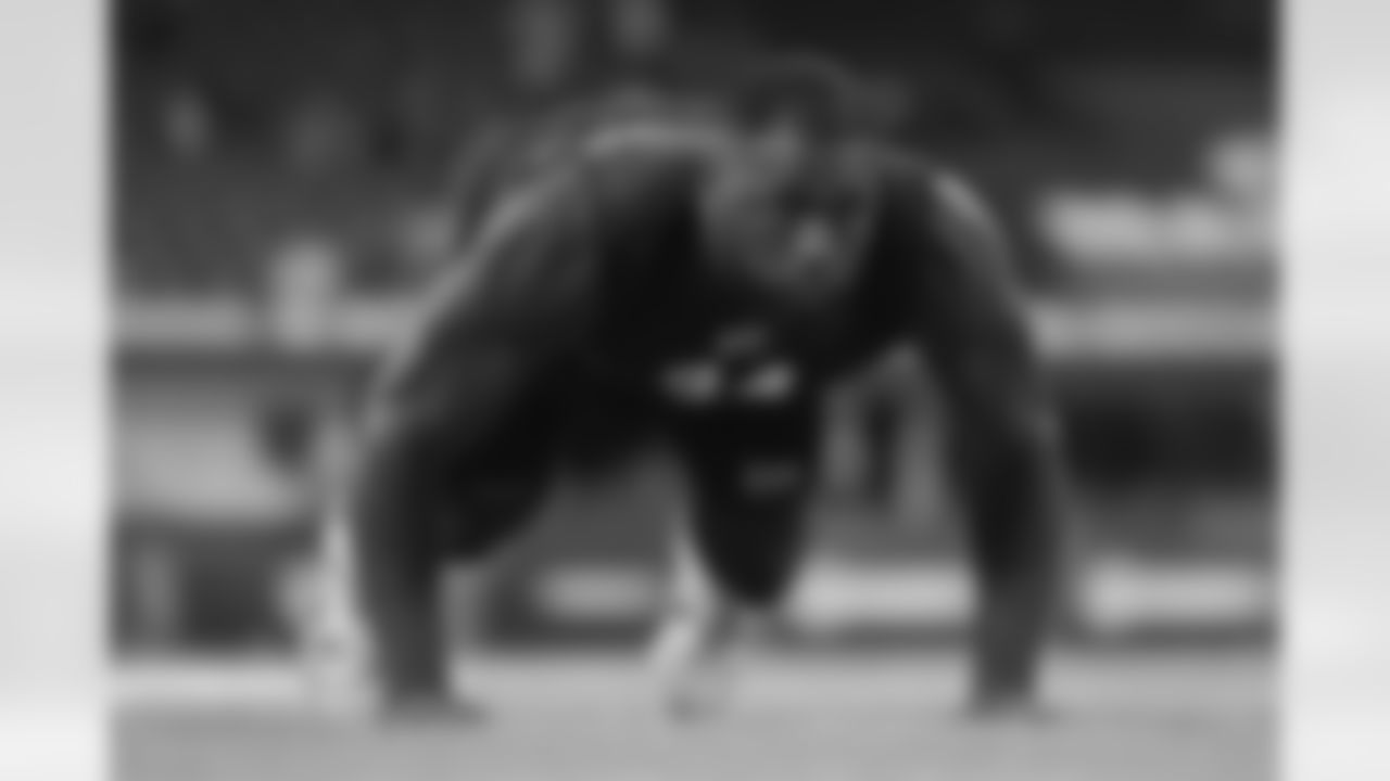 Auburn defensive lineman Keyron Crawford (34) runs a drill at the NFL football scouting combine in Indianapolis, Thursday, Feb. 26, 2026. (AP Photo/Michael Conroy)