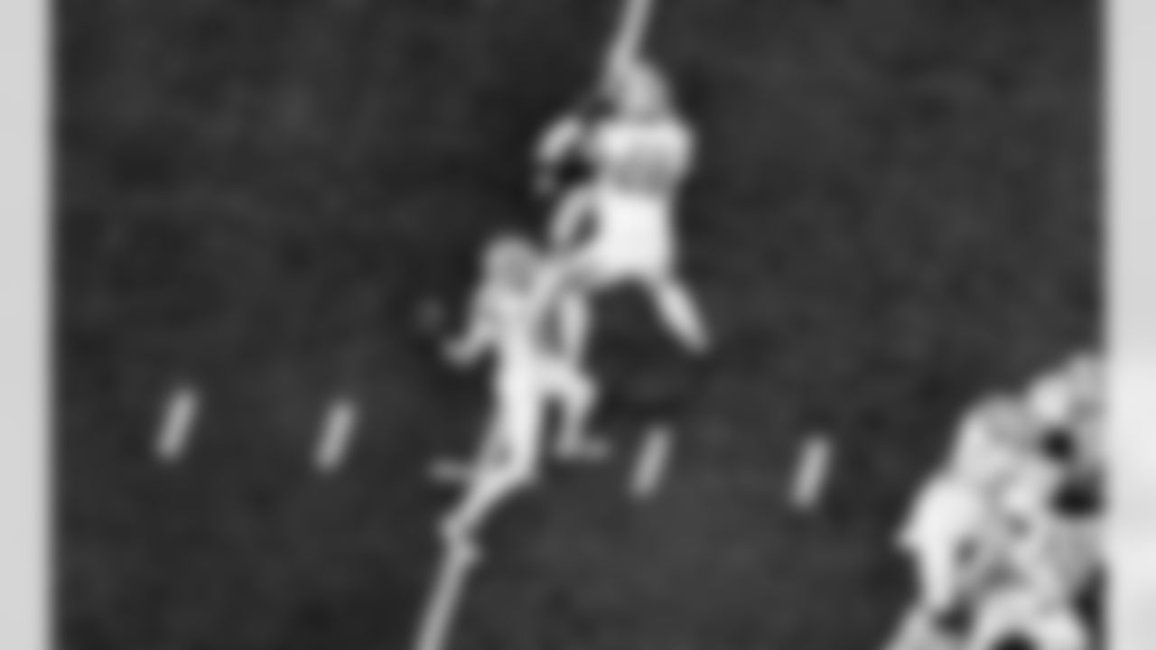 Detroit Lions quarterback Jared Goff (16) and Detroit Lions tackle Taylor Decker (68) during an NFL football game against the Dallas Cowboys on Thursday, Dec. 4, 2025 in Detroit. (Jeff Nguyen/Detroit Lions via AP)