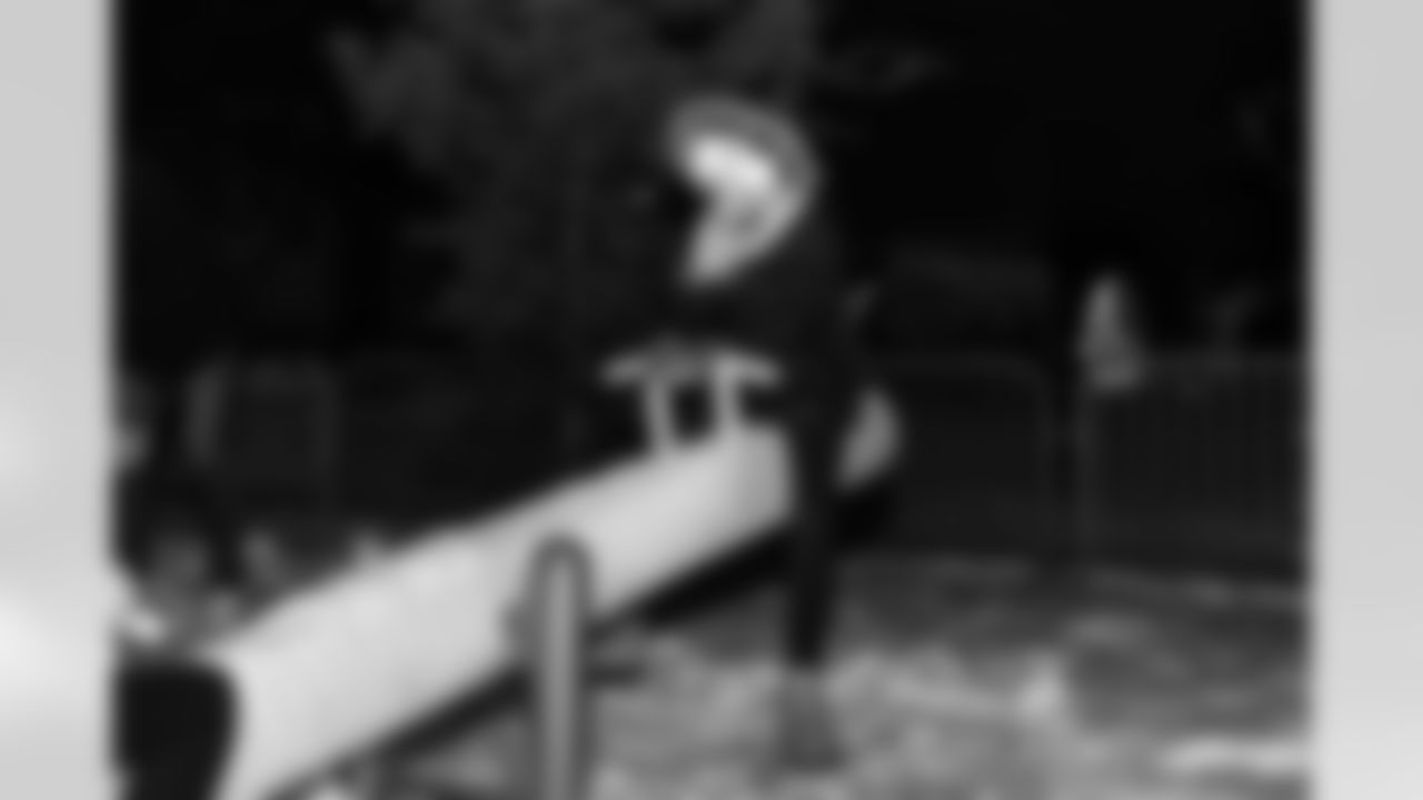 A Cub Club member on the teeter totter during the Cub Club Wild Lights event at the Detroit Zoo on Dec. 10, 2025 in Royal Oak, Mich. (Stephanie VanWagoner/Detroit Lions)