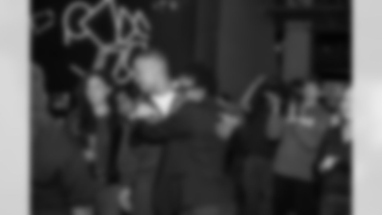 Detroit Lions wide receiver Amon-Ra St. Brown (14) greets guests during a Strike for Literacy event at Five Iron Golf on Nov. 3, 2025 in Detroit.(Carl Jones II/Detroit Lions)