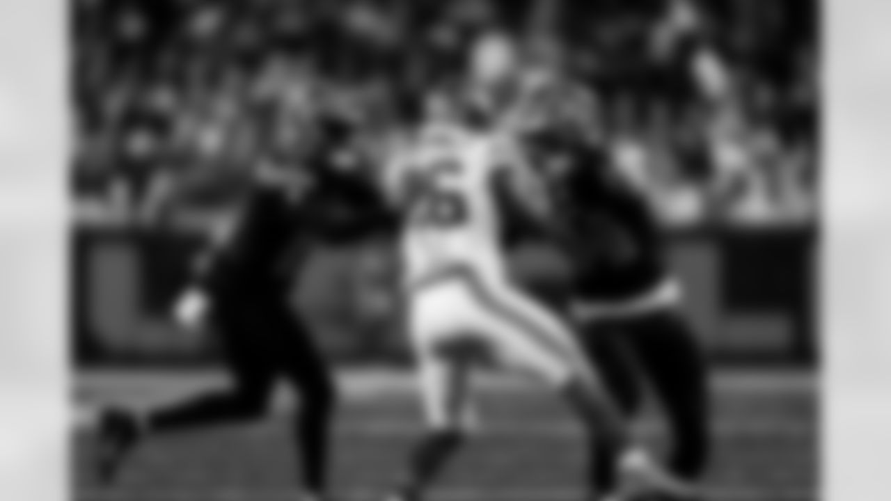 Detroit Lions cornerback Amik Robertson (21) and Detroit Lions linebacker Alex Anzalone (34) during an NFL football game against the New York Giants on Sunday, Nov. 23, 2025 in Detroit. (Jeff Nguyen/Detroit Lions via AP)