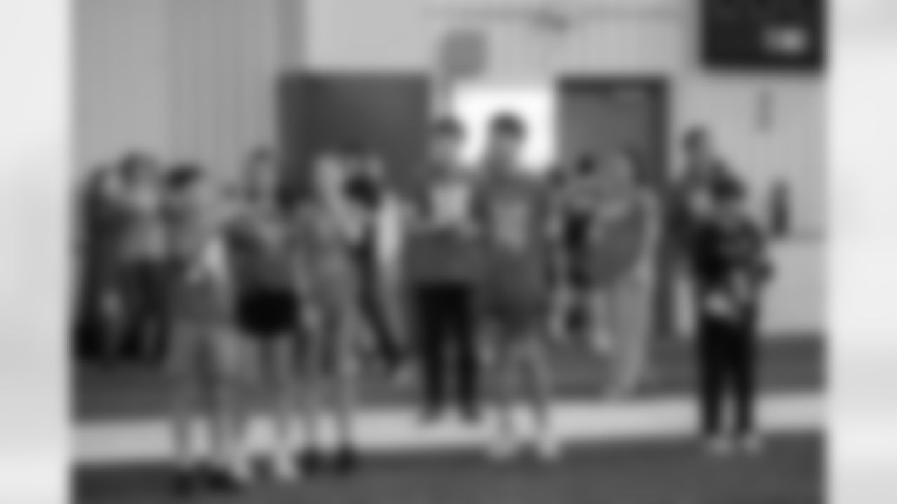 Students of the East Jordan Shoe Club tour the practice field following a shoe design competition event at the Meijer Performance Center on Sept. 27, 2025 in Allen Park, Mich. (Carl Jones II/Detroit Lions via AP)