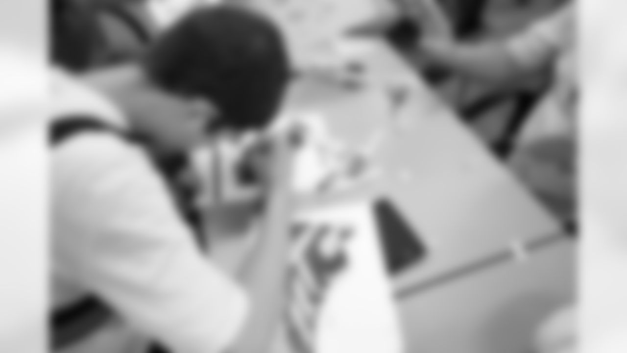 Shoe Club students work on their designs during a shoe design competition event at the Meijer Performance Center on Sept. 27, 2025 in Allen Park, Mich. (Carl Jones II/Detroit Lions via AP)