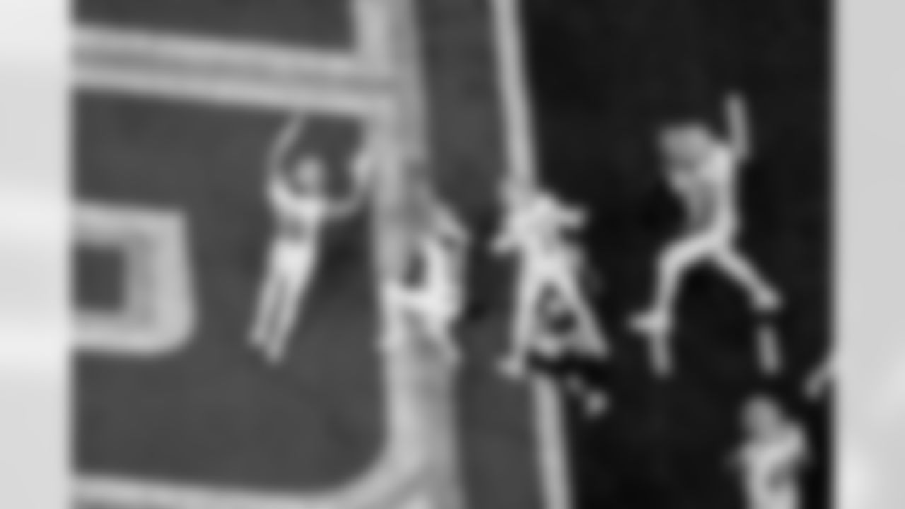 Detroit Lions wide receiver Isaac TeSlaa (18), Detroit Lions running back Jahmyr Gibbs (0), Detroit Lions wide receiver Jameson Williams (1), and Detroit Lions tackle Dan Skipper (70) celebrate after scoring a touchdown during an NFL football game against the Dallas Cowboys on Thursday, Dec. 4, 2025 in Detroit. (Jeff Nguyen/Detroit Lions via AP)