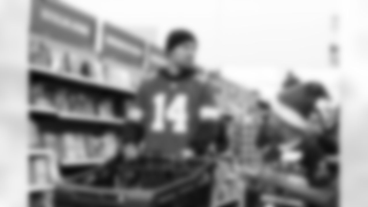 Detroit Lions wide receiver Amon-Ra St. Brown (14) during Shop with a Lion at Meijer on Dec. 8, 2025 in Detroit. (Stephanie VanWagoner/Detroit Lions)