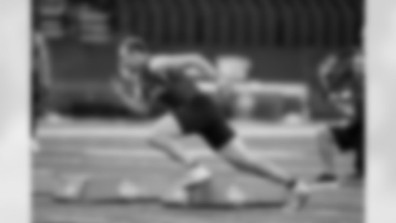 Iowa linebacker Jack Campbell runs a drill at the NFL football scouting combine in Indianapolis, Thursday, March 2, 2023. (AP Photo/Darron Cummings)