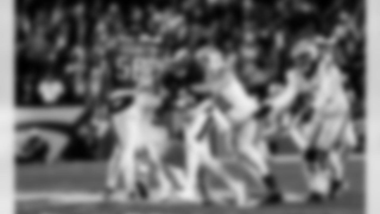 Detroit Lions edge rusher Aidan Hutchinson (97) and Detroit Lions defensive lineman Roy Lopez (51) sack Philadelphia Eagles quarterback Jalen Hurts (1) during an NFL football game against the Philadelphia Eagles on Sunday, Nov. 16, 2025 in Philadelphia. (Jeff Nguyen/Detroit Lions via AP)