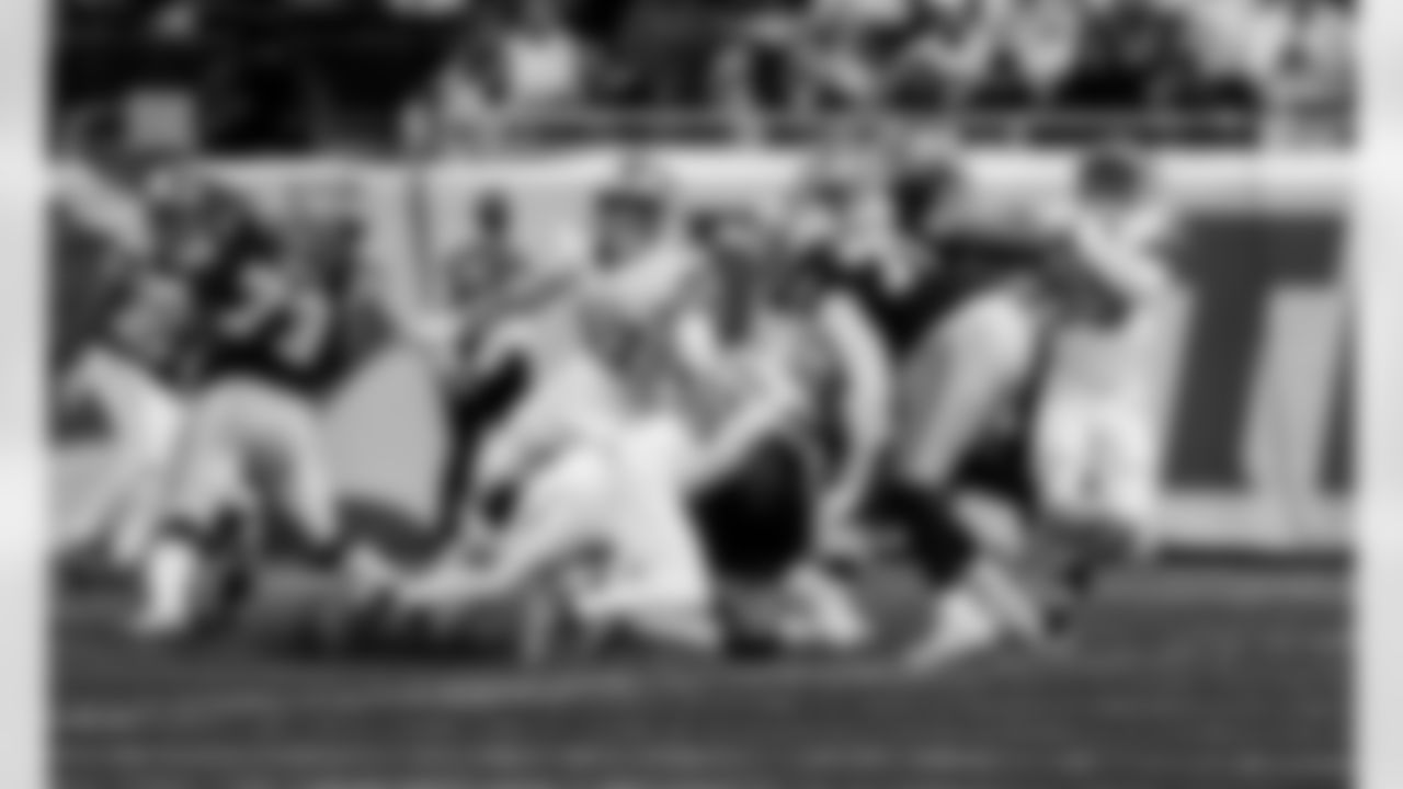 Detroit Lions edge rusher Al-Quadin Muhammad (96) sacks Dallas Cowboys quarterback Dak Prescott (4) during an NFL football game against the Dallas Cowboys on Thursday, Dec. 4, 2025 in Detroit. (Jeff Nguyen/Detroit Lions via AP)