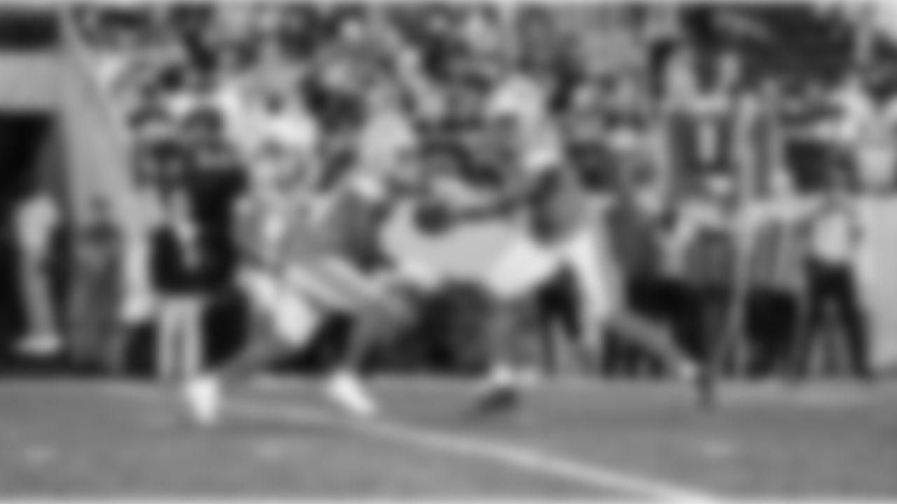 Detroit Lions running back Jabari Small (42) and Detroit Lions quarterback Hendon Hooker (2) during an NFL football game against the Los Angeles Chargers, Thursday, July 31, 2025, in Canton, Ohio. (Jeff Nguyen/Detroit Lions via AP)