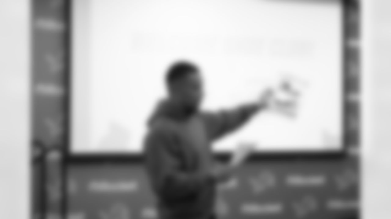 Detroit Lions wide receiver Amon-Ra St. Brown (14) announces the winning design during a shoe design competition event at the Meijer Performance Center on Sept. 27, 2025 in Allen Park, Mich. (Carl Jones II/Detroit Lions via AP)