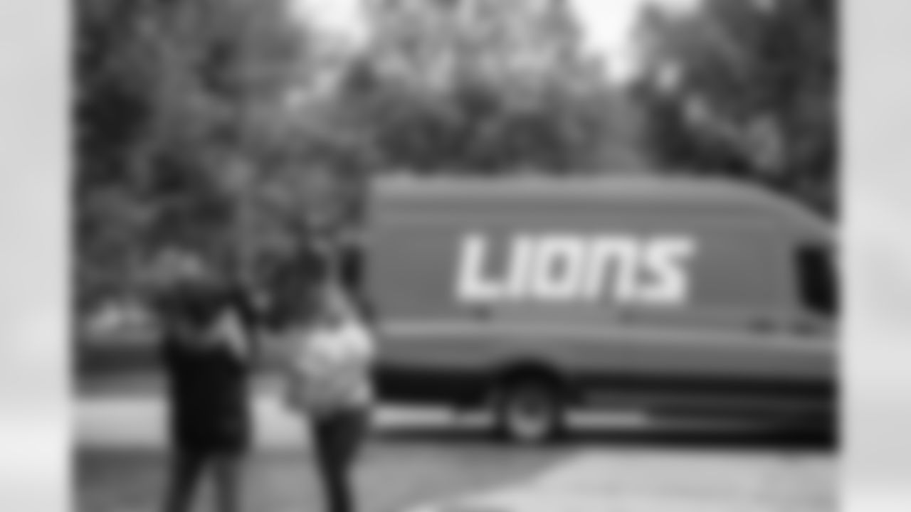 Honored recipient Fallon Hall being surprised with a "Tailgate in a Box" gift from the Detroit Lions on Sept. 25, 2024 in Lathrup Village, MI. (Jeff Nguyen/Detroit Lions via AP)