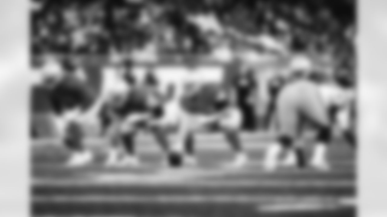 Detroit Lions tackle Penei Sewell (58), Detroit Lions offensive lineman Graham Glasgow (60), and Detroit Lions center Frank Ragnow (77) during a NFL football game against the Green Bay Packers on November 23, 2023 in Detroit. (Jeff Nguyen/Detroit Lions via AP)