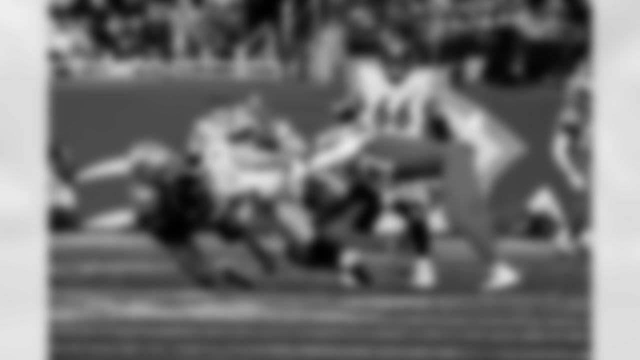 Detroit Lions edge rusher Aidan Hutchinson (97) sacks Pittsburgh Steelers quarterback Aaron Rodgers (8) during an NFL football game against the Pittsburgh Steelers on Sunday, Dec. 21, 2025 in Detroit. (Jeff Nguyen/Detroit Lions via AP)