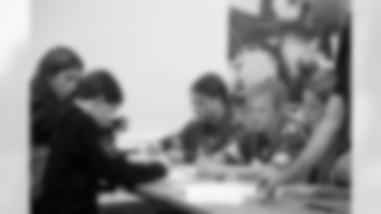 Shoe Club students work on their designs during a shoe design competition event at the Meijer Performance Center on Sept. 27, 2025 in Allen Park, Mich. (Carl Jones II/Detroit Lions via AP)