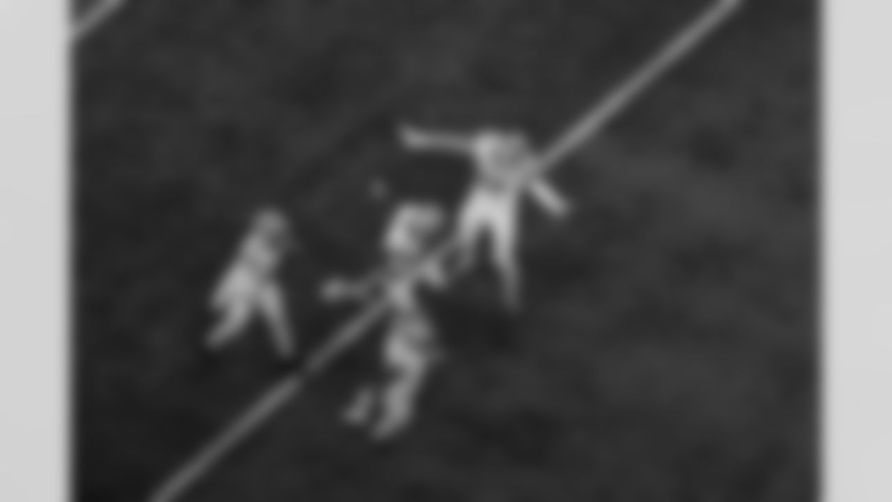 Detroit Lions cornerback Amik Robertson (21), Detroit Lions cornerback D.J. Reed (4), Detroit Lions safety Daniel Thomas (2), Detroit Lions edge rusher Aidan Hutchinson (97) celebrate during an NFL football game against the Dallas Cowboys on Thursday, Dec. 4, 2025 in Detroit. (Stephanie VanWagoner/Detroit Lions)