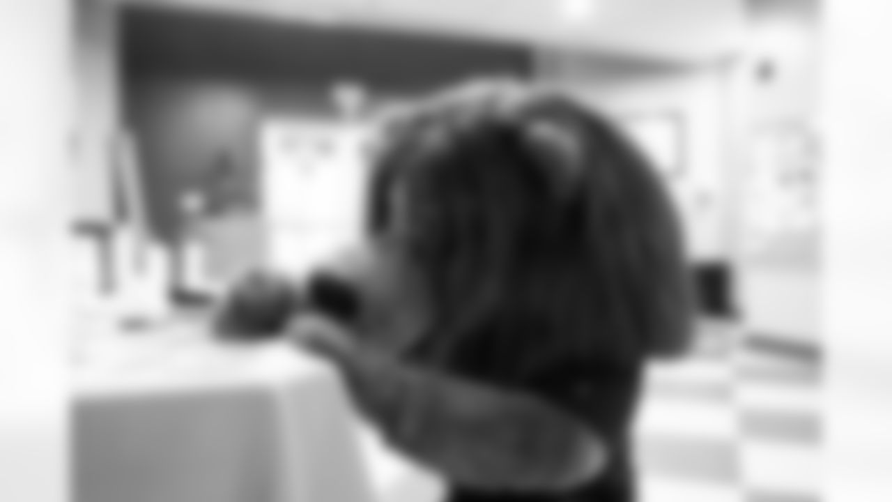 Detroit Lions Mascot Roary participating in a thankfulness activity during a Thanksgiving lunch event at Alternatives For Girls on Nov. 28, 2025 in Detroit. (Izzy Rincon/Detroit Lions)