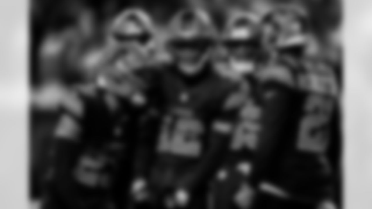 Detroit Lions safety Thomas Harper (12) celebrates with Detroit Lions cornerback Rock Ya-Sin (23) and Detroit Lions cornerback Amik Robertson (21) during an NFL football game against the New York Giants on Sunday, Nov. 23, 2025 in Detroit. (Jeff Nguyen/Detroit Lions via AP)