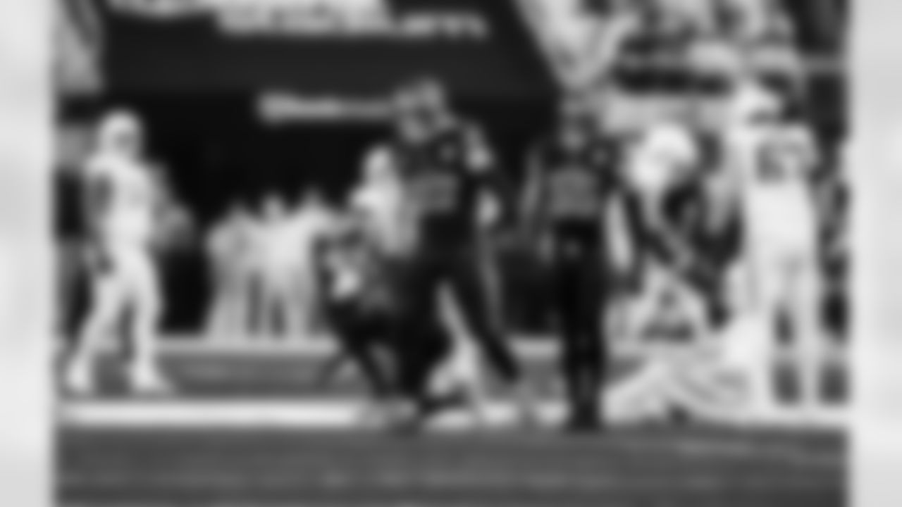 Detroit Lions edge rusher Aidan Hutchinson (97) celebrates after a sack during an NFL football game against the Minnesota Vikings on Thursday, Dec. 25, 2025 in Minneapolis. (Jeff Nguyen/Detroit Lions via AP)