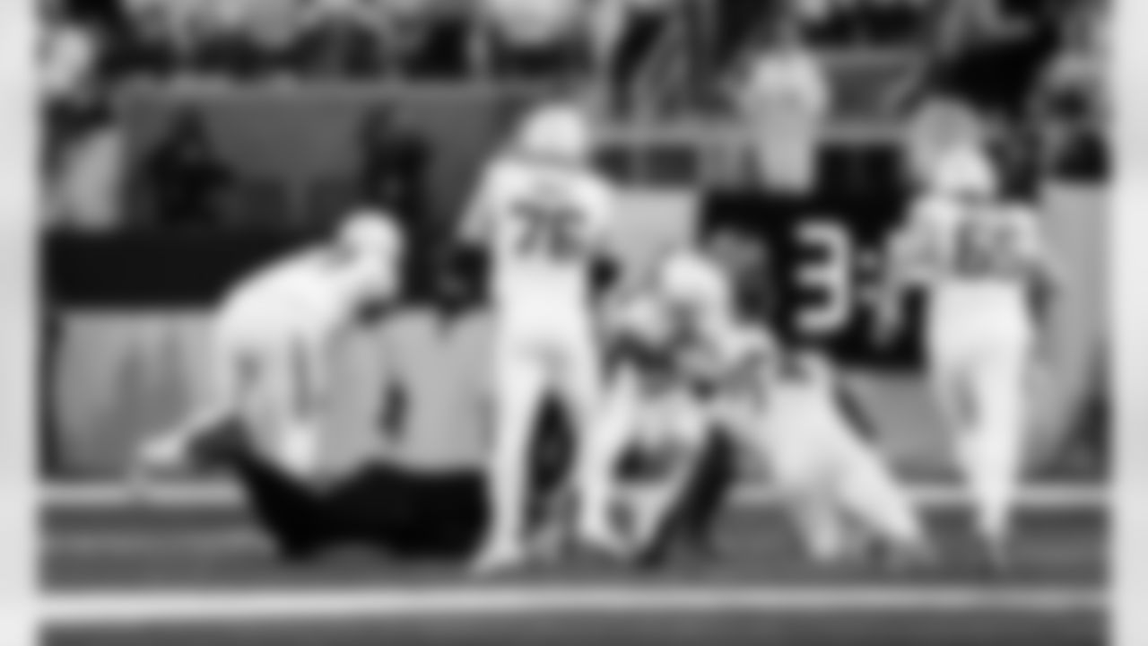 Detroit Lions defensive lineman Roy Lopez (51) sacks Minnesota Vikings quarterback Max Brosmer (12) during an NFL football game against the Minnesota Vikings on Thursday, Dec. 25, 2025 in Minneapolis. (Jeff Nguyen/Detroit Lions via AP)